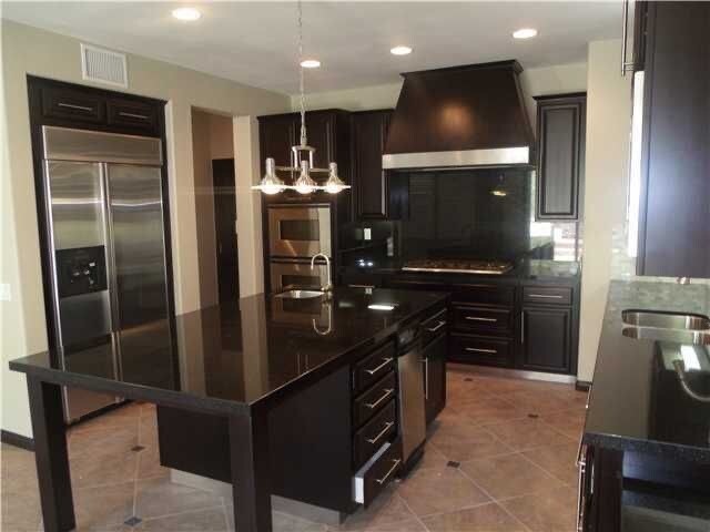 all stainless steel appliances including built=in refrigerator - 1332 N Paradise Ridge Way