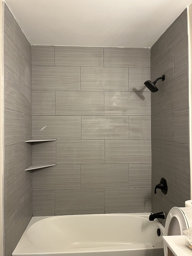 Bathroom tile shower - 2741 Jones Ave