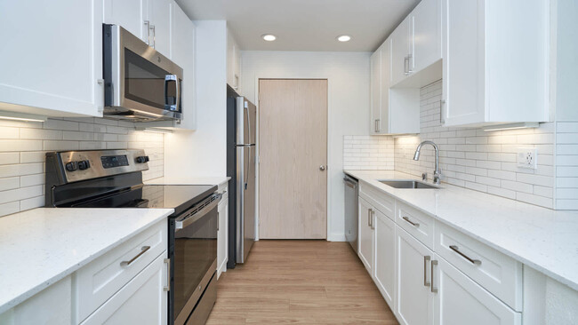 Kitchen with Stainless Steel Appliances - Ivorywood