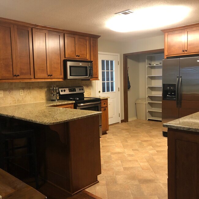 Open kitchen with pantry - 2316 Demaret Dr