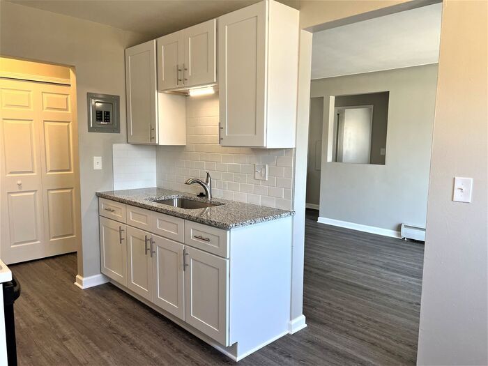 Primary Photo - Luxury Living in the Heart of Downtown Uti...