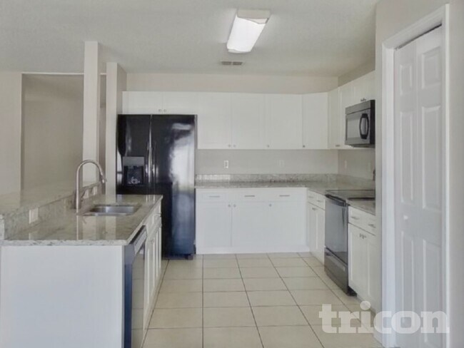 Foto del edificio - 3247 Amberley Park Cir