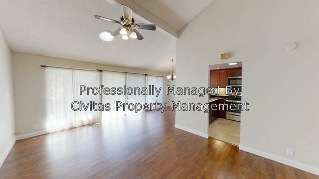 Building Photo - Bright spacious townhome available now