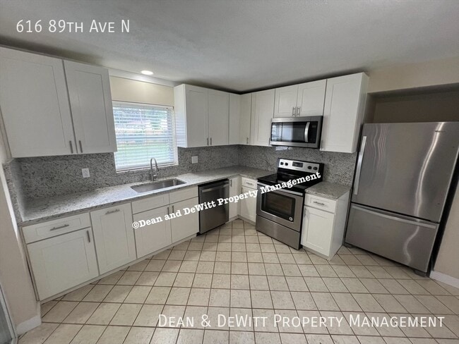 Building Photo - 616 89th Ave N