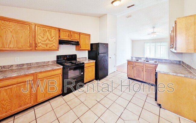Building Photo - 10850 Wahine Dr N