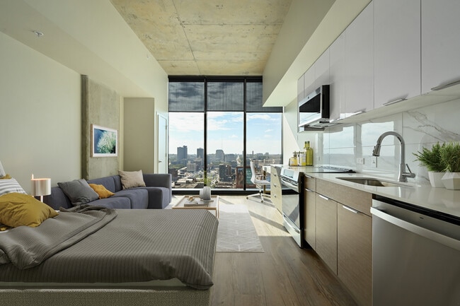El salón y la cocina de The Moten en Three Light Luxury Apartments. - Three Light Luxury Apartments