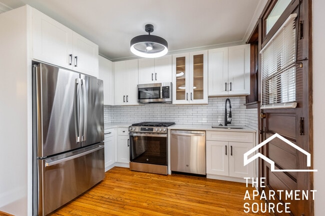 Building Photo - 3126.5 North Spaulding Ave. Unit 1E