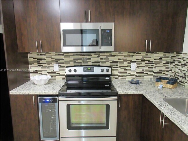 Building Photo - 3100 NW 42nd Avenue Unit D202