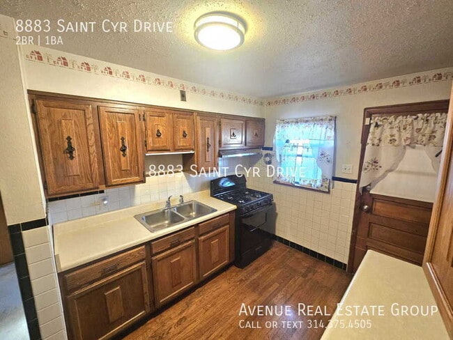 Building Photo - 8883 St Cyr Dr