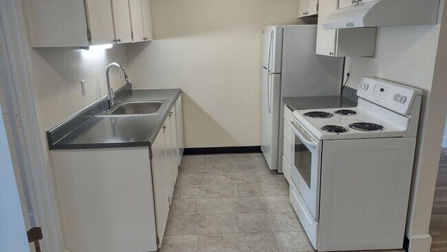 Photo - Upper 1bed, off street parking, onsite coi... House