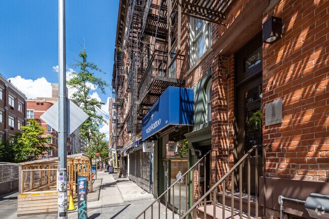 Sidewalk - 161 W Fourth St