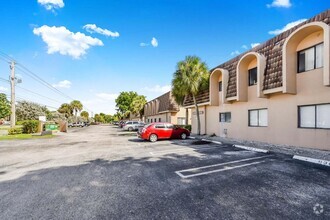 Building Photo - 10936 Royal Palm Blvd