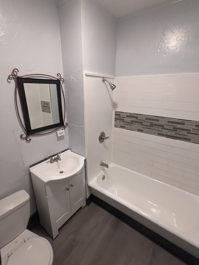 Full Bathroom with bathtub & shower - 213 W 10th Ave