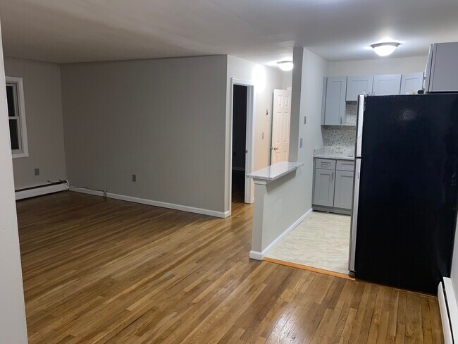 new kitchen with granite counters - 222 Montgomery St