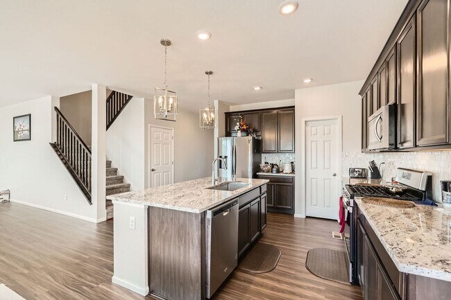 Photo - Wonderful 4/2.5 Home in SE Longmont. Large Rooms and Great Fenced Yard. Attached Garage.