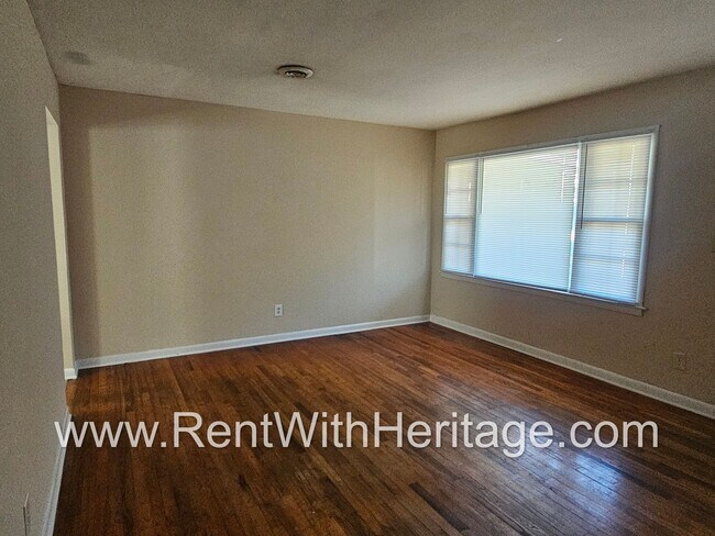 Building Photo - Great Brick Ranch / Harwood Floors / Huge Shop or Extra Storage / No Garage / Great Private Back ...