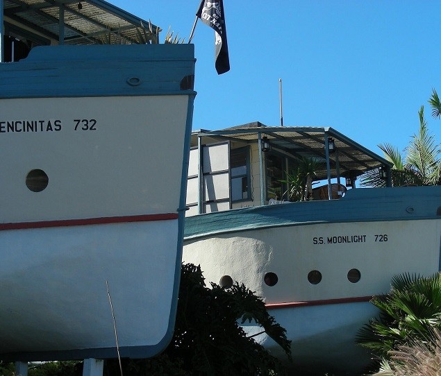 The two boat houses were designed in 1929 and are a local landmark