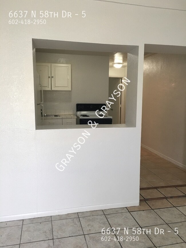 Photo - 6637 N 58th Dr Apartment