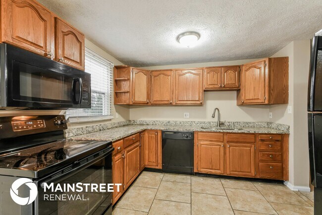Building Photo - 1419 Mutz Dr