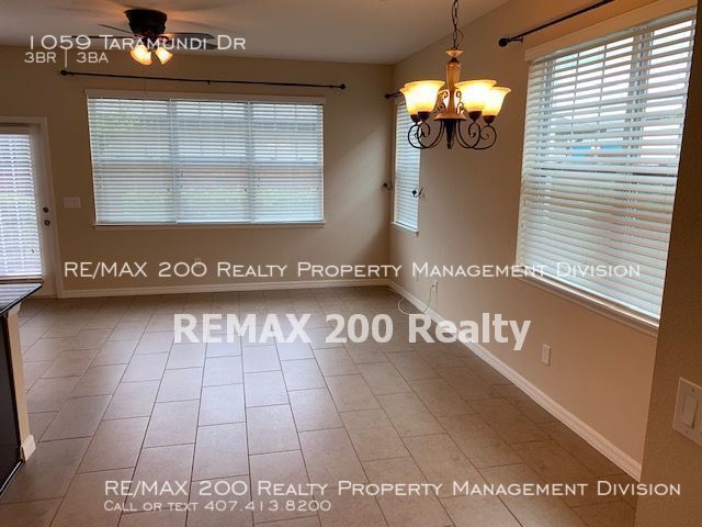 Building Photo - Desirable Townhouse at Oviedo on the Park!