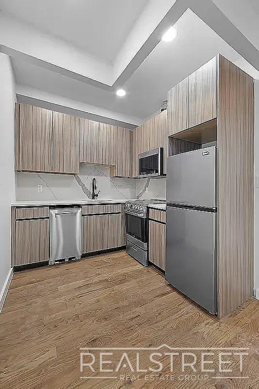 Foto del edificio - Modern Williamsburg Apartment w/ W/D, Central A/C & Shared Roof Deck