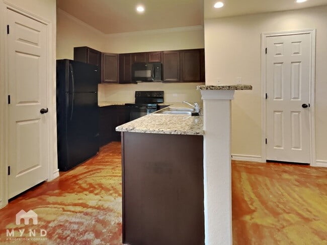 Building Photo - 6415 Melanzane Ave