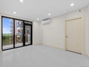 Building Photo - 124-28 Queens Blvd