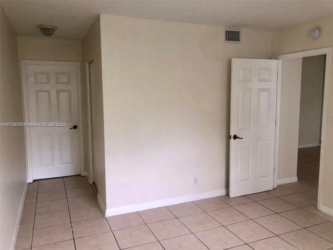 Building Photo - 11213 Royal Palm Blvd