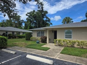 Building Photo - 7056 W Country Club Dr N