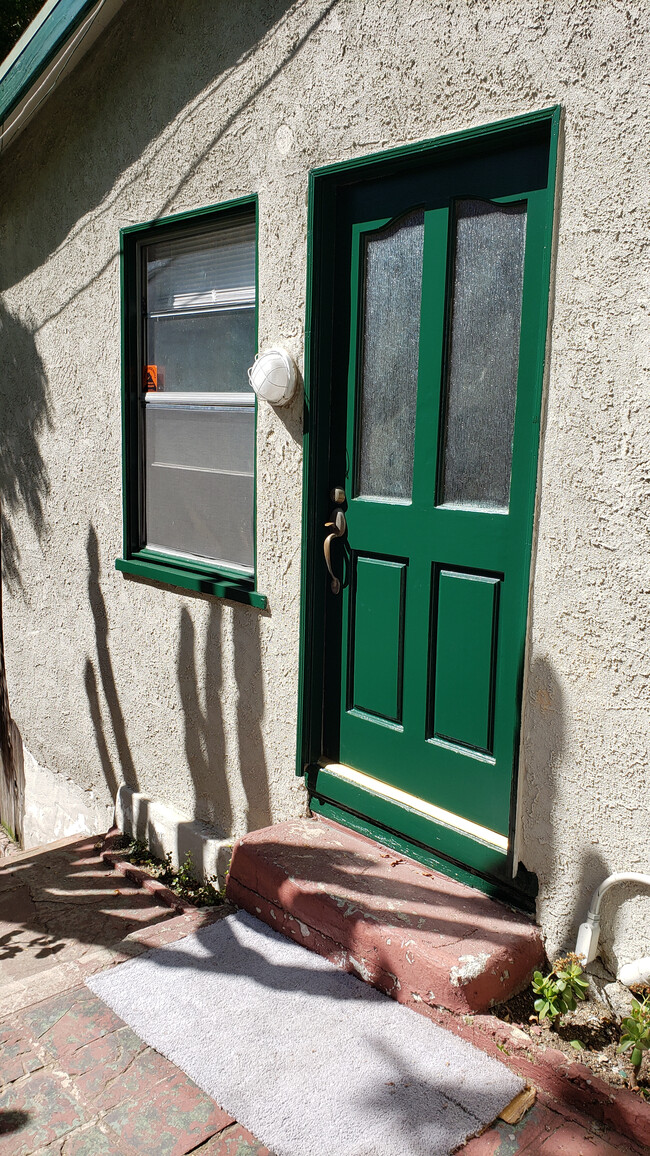 Front door (cactus shadow) - 8465 Kirkwood Dr