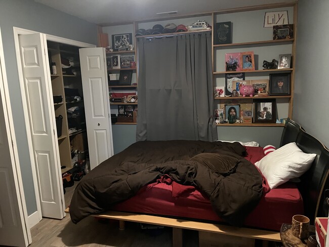 Bedroom. About 10 by 10 with shelves and two closets with built in drawers and cubbies. - 5723 213th St SW