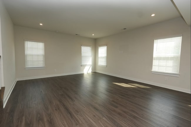 Building Photo - This wonderful home has a covered rocking ...