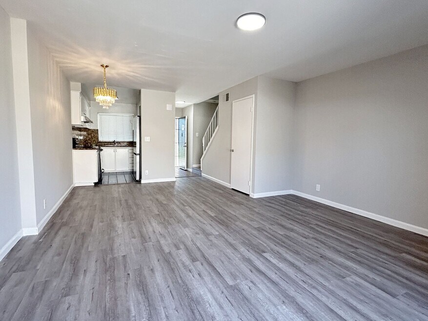 Move-in ready Evergreen townhome with private backyard, detached 2-car garage, and great communit...
