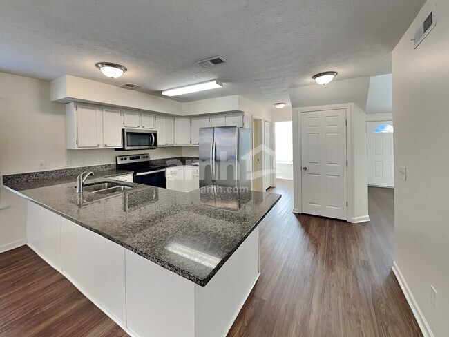 Foto del edificio - 5112 Greer Station Dr