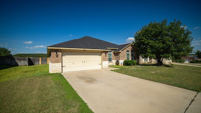 Building Photo - Beautiful 4-Bedroom Home with Spacious Bac...