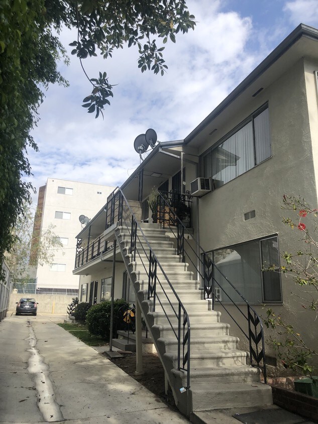 Side view, apartment upstairs - 1446 N Martel Ave