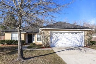 Building Photo - 6827 Rapid River Dr