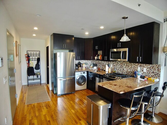 View of kitchen area - 225 E 111th St