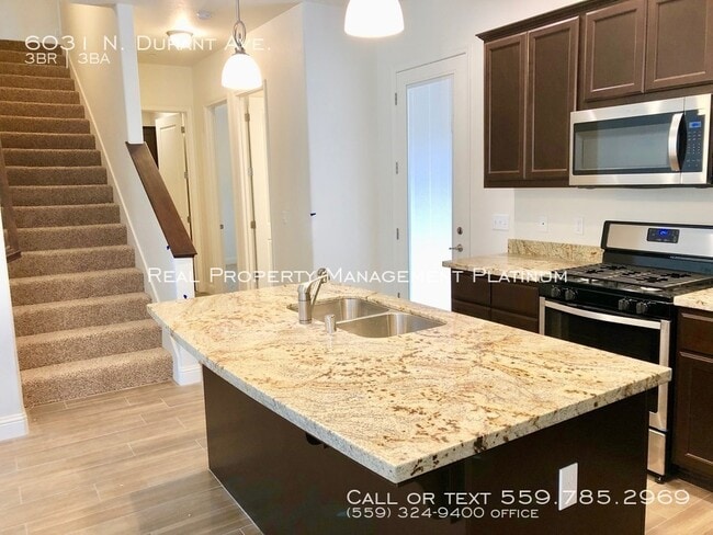 Foto del edificio - 6031 N Durant Ave
