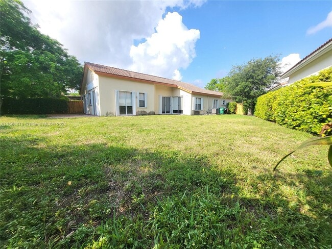Building Photo - 5877 NW 108th Pl
