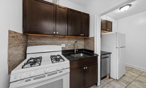 Building Photo - 1361 W Estes Ave