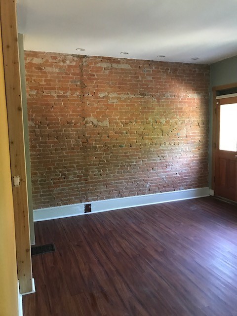 Living room brick exposed - 509 Chestnut St