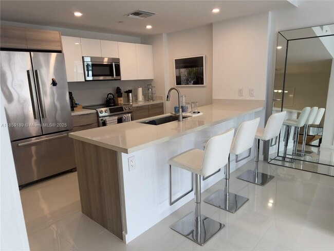 Foto del edificio - 9940 W Bay Harbor Dr