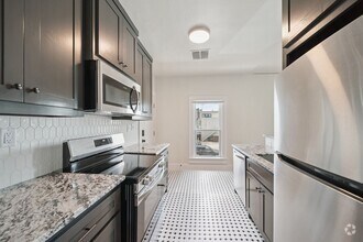 Building Photo - 1437 S Peoria Ave