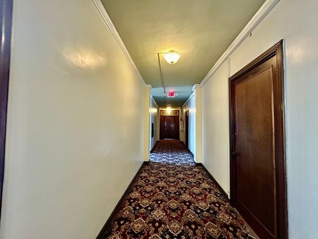 Building Photo - 7th Floor Studio Condo in Historic Buildin...