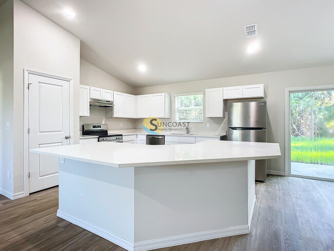 Building Photo - BE THE FIRST TO MOVE IN THIS 4/2 IN PALM C...