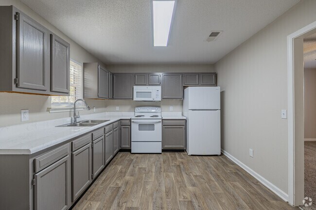 2 habitaciones, 1 baño - 977 pies cuadrados - Cocina - Magnolia Village Apartments