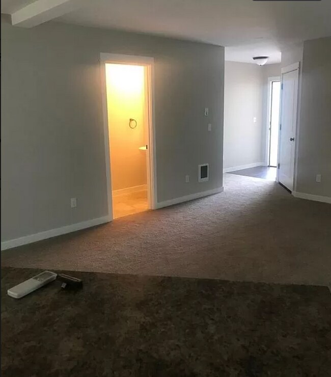 Entry, garage access door, 1/2 bathroom - 101 Rainbow Way