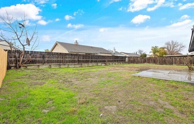 Building Photo - Solar equipped Lemoore home coming soon!