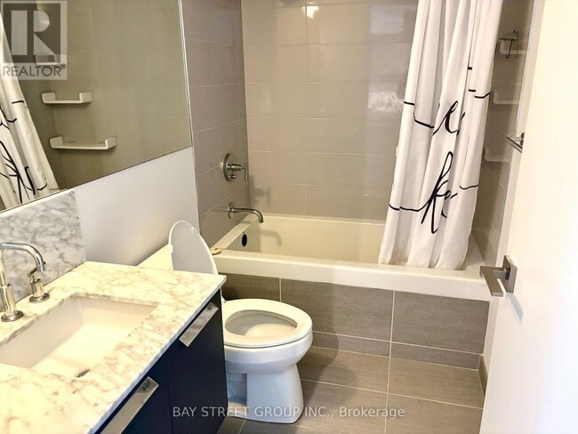 Building Photo - 50 Charles St E